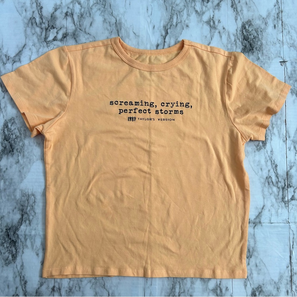 Taylor Swift Peach Short Sleeve Tee - 'screaming, crying, perfect storms'